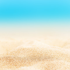 Fototapeta na wymiar Summer tropical background with sand, sea and sky. Summertime card..