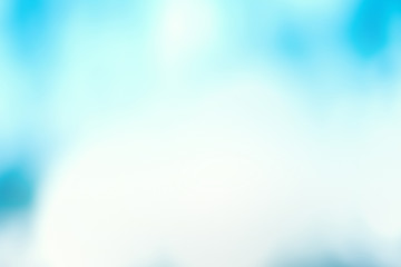 Abstract light blue background with soft bokeh.