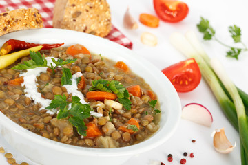 Lentil with carrot and onion in a white bowl. Healthy lifestyle. Diet menu.