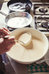 Grandmother making pancakes