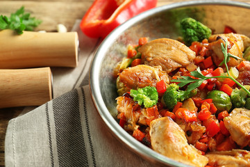Chicken stir fry with vegetables in pan