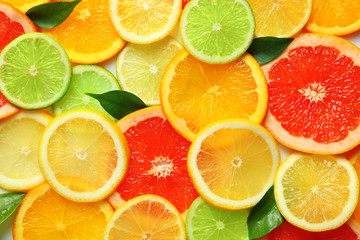 Fototapeta na wymiar Sliced citrus fruits background