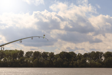 fishing rod and river