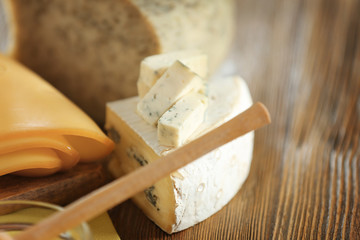 Variety of cheese on table