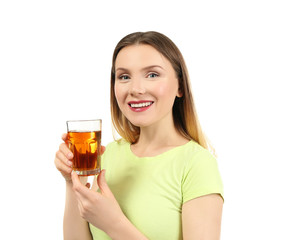 Beautiful woman with glass of fresh juice on white background