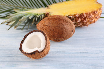 Coconut and pineapple on table
