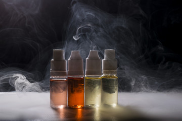 electronic cigarette, vaping device with e liquid background.