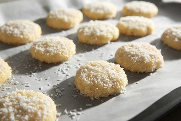 Fototapeta na wymiar Baking tray with coconut cookies, closeup