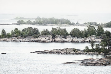 Misty or foggy in low colour of the archipelago
