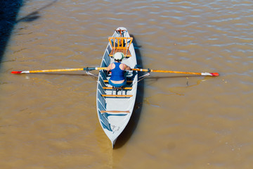 Woman rows in Puerto Madero seen from above, Buenos Aires, Argentina