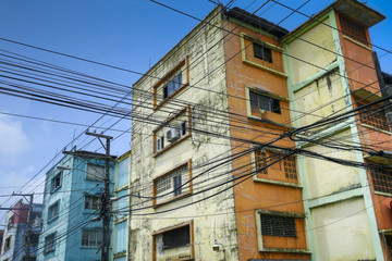 Fototapeta na wymiar Decaying Buildings and Power Lines in Colon Panama
