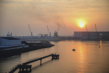 Fototapeta premium Sunrise over port terminal