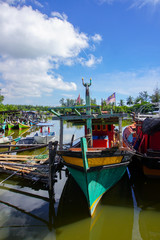 Fototapeta na wymiar View of fishing village in Malaysia with boats.