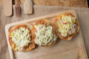 Homemade mini pizza buns different topped