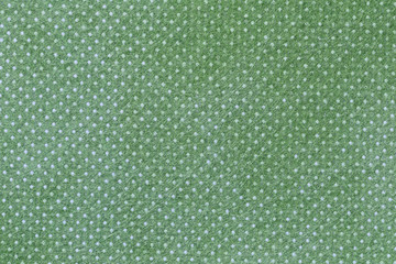Texture of green strand fabric.