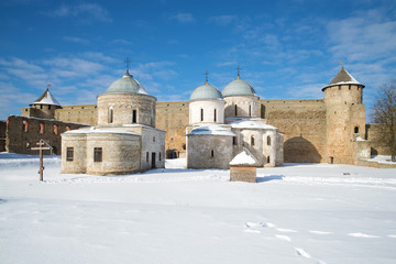 Fototapeta na wymiar Sunny snowy day in the Ivangorod fortress. Ivangorod, Russia