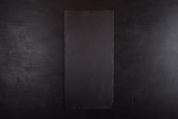 Black background with black stone tray for product presentation