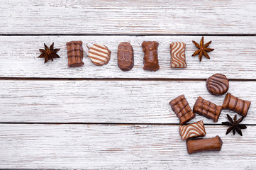 Fototapeta na wymiar set of chocolates on a beautiful wooden table
