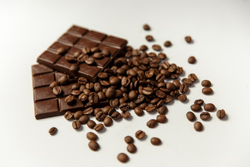 Picture of coffee beans and chocolate on a white background