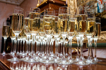 A lot of glasses with champagne
