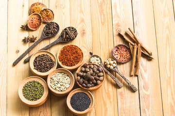 Herbs and spices on a wooden board