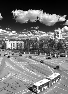Saint-Petersburg. Russia. View from high point at the road with buses and cars. Smolny cathedral.Square of proletarian dictatorship. Center of the city.