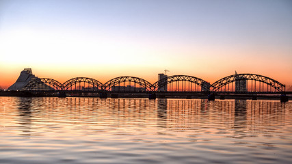 Riga. Latvia. Library and the Railway Bridge at sunset.