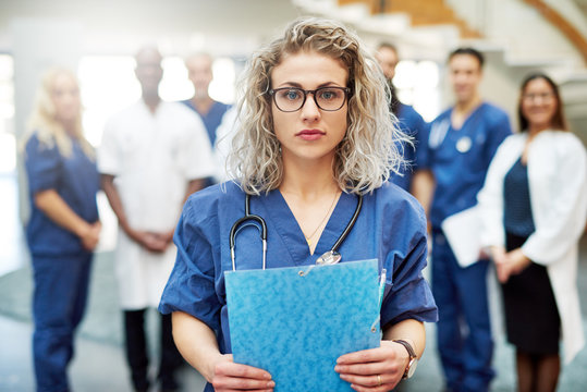 Young medicine worker standing in hospital