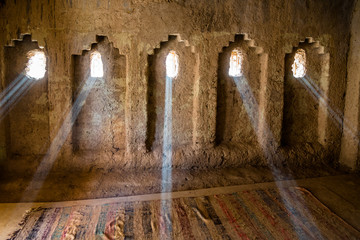 Naklejka premium Rays of sunlight in Amridil Kasbah - Morocco