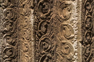 Ta Prohm temple beautiful ancient bas-relief in Angkor, Siem Reap, Cambodia.