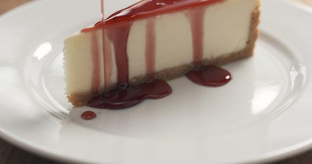 cherry sauce on traditional new york cheesecake, 4k photo