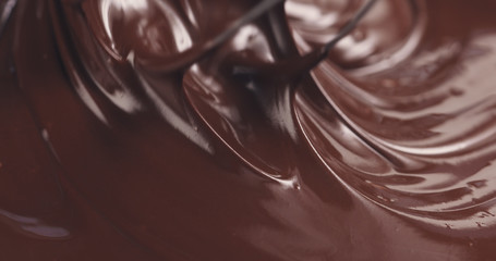mixing melted premium dark chocolate with a whisk toned, 4k photo