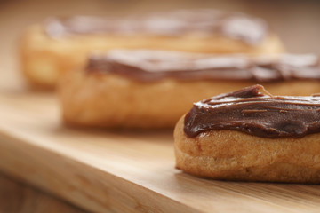 traditional french eclairs with chocolate ganache, shallow focus