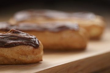 traditional french eclairs with chocolate ganache, shallow focus