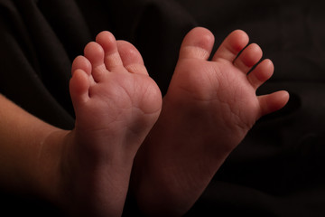 baby feet with little toe