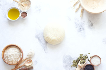 Ingredients for baking bread. Preparation of the bread before baking. White background. Space for inscriptions.