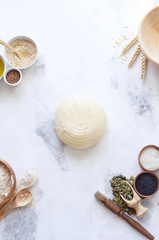 Ingredients for baking bread. Preparation of the bread before baking. White background. Space for inscriptions.