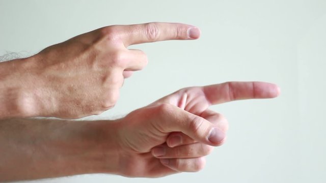 Man's pointing forefingers