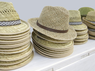 lots of straw hats