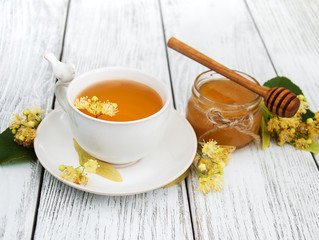 cup of herbal tea with linden flowers