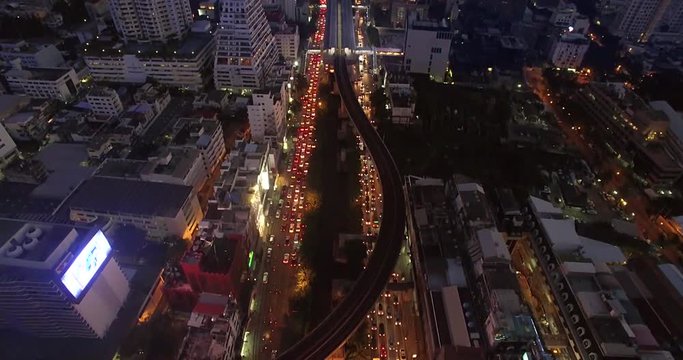 Aerial Drone Push In Shot Along Busy Bangkok Street, Thailand
