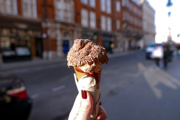 Women hand holding icecream cone