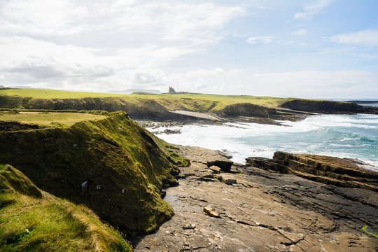 beautiful landscape of Irish coast with classiebawn castle at background