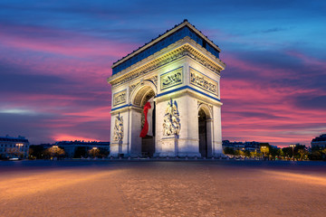 Naklejka na ściany i meble Arc de Triomphe and Champs Elysees, Landmarks in center of Paris, at sunset. Paris, France