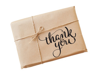 envelope kraft paper tied with string on a white background and text Thank you. Calligraphy...