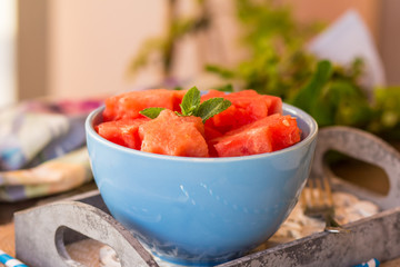 Fresh watermelon cut in star shape with mint