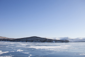 Winter landscape. Ice of Lake Baikal near Ogoi island.