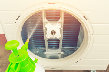 Air compressor part of air conditioner system and cleaning work.