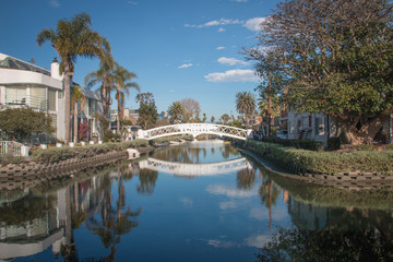 Fototapeta na wymiar LITTLE VENICE, CALIFORNIA, USA - JANUARY 2017. Houses and bridge at Venice Canal Historic District.