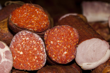 Fresh homemade smoked sausage and smoked meat to eat  on the table1